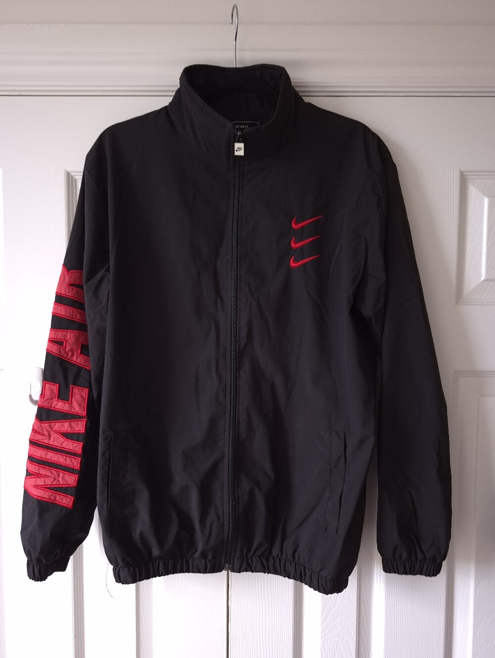 Nike Black Windbreaker Jacket with Red Logos